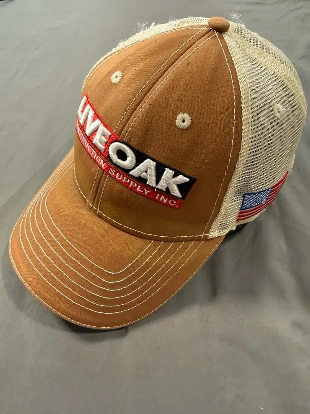 Oak Construction Supply Husqvarna Trucker Hat Brown Tan Snapback Cap